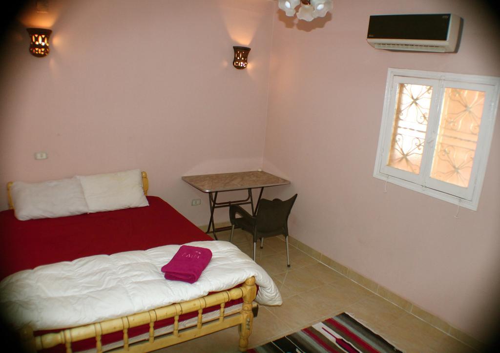Pyramids Loft Homestay Kafrat al Jabal Номер фото