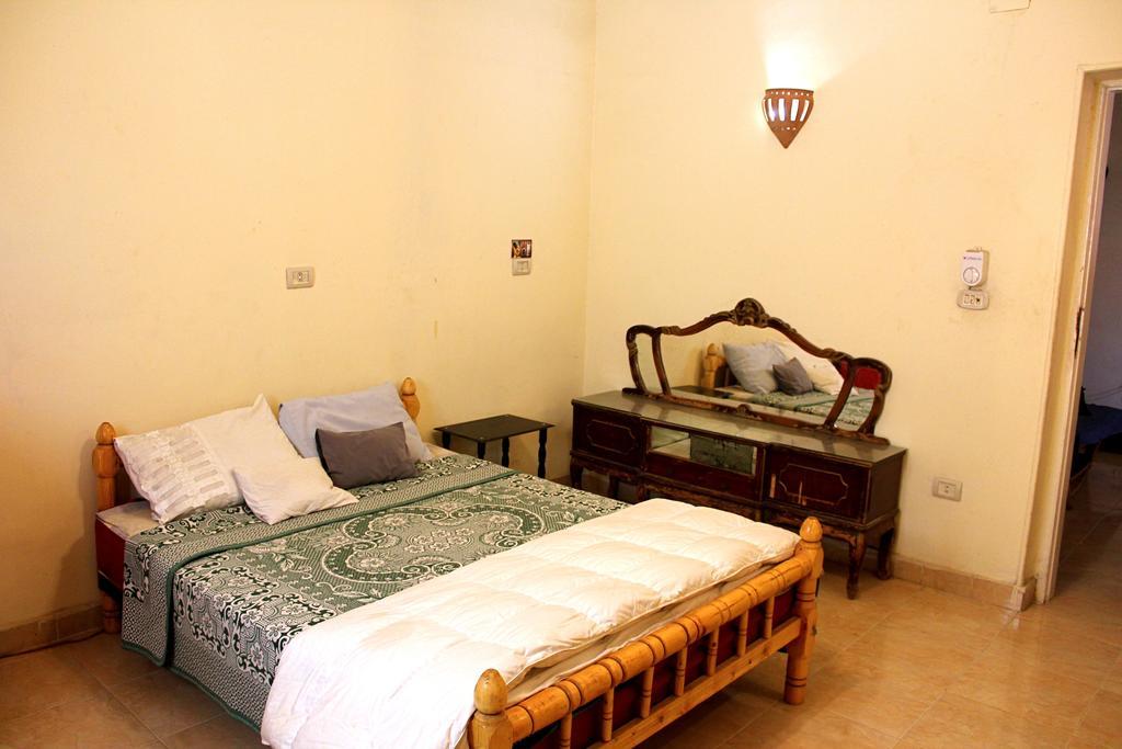 Pyramids Loft Homestay Kafrat al Jabal Номер фото