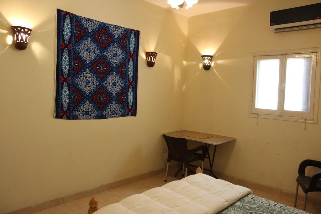 Pyramids Loft Homestay Kafrat al Jabal Номер фото