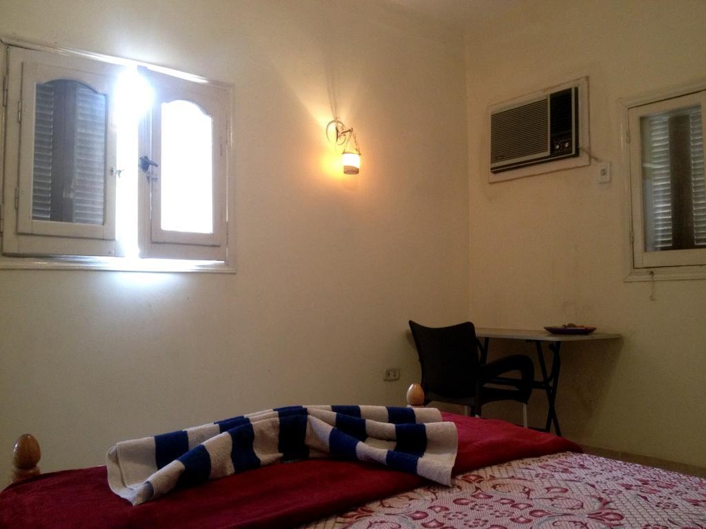 Pyramids Loft Homestay Kafrat al Jabal Номер фото