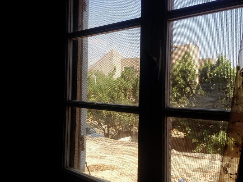 Pyramids Loft Homestay Kafrat al Jabal Номер фото