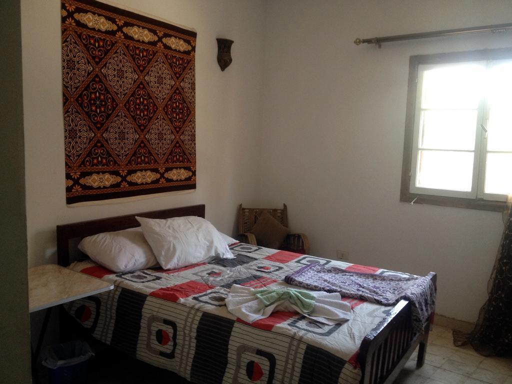 Pyramids Loft Homestay Kafrat al Jabal Номер фото